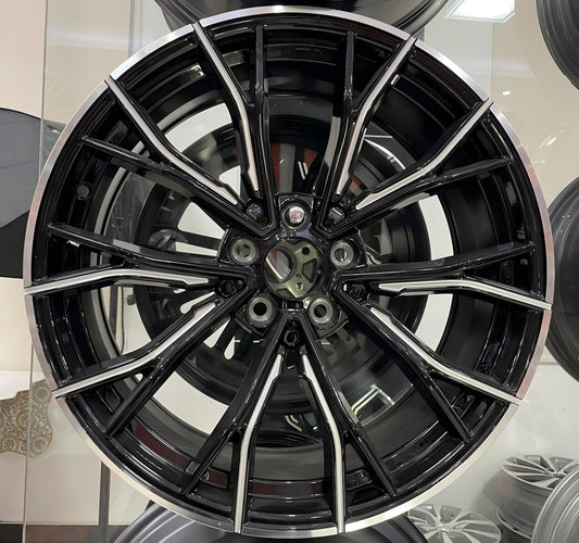 BMW 20 inch OEM replacement alloy wheel with black machined finish and milled windows