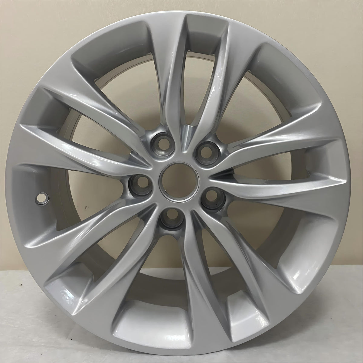 Buick Verano 16 inch OEM replacement alloy wheel in full silver finish
